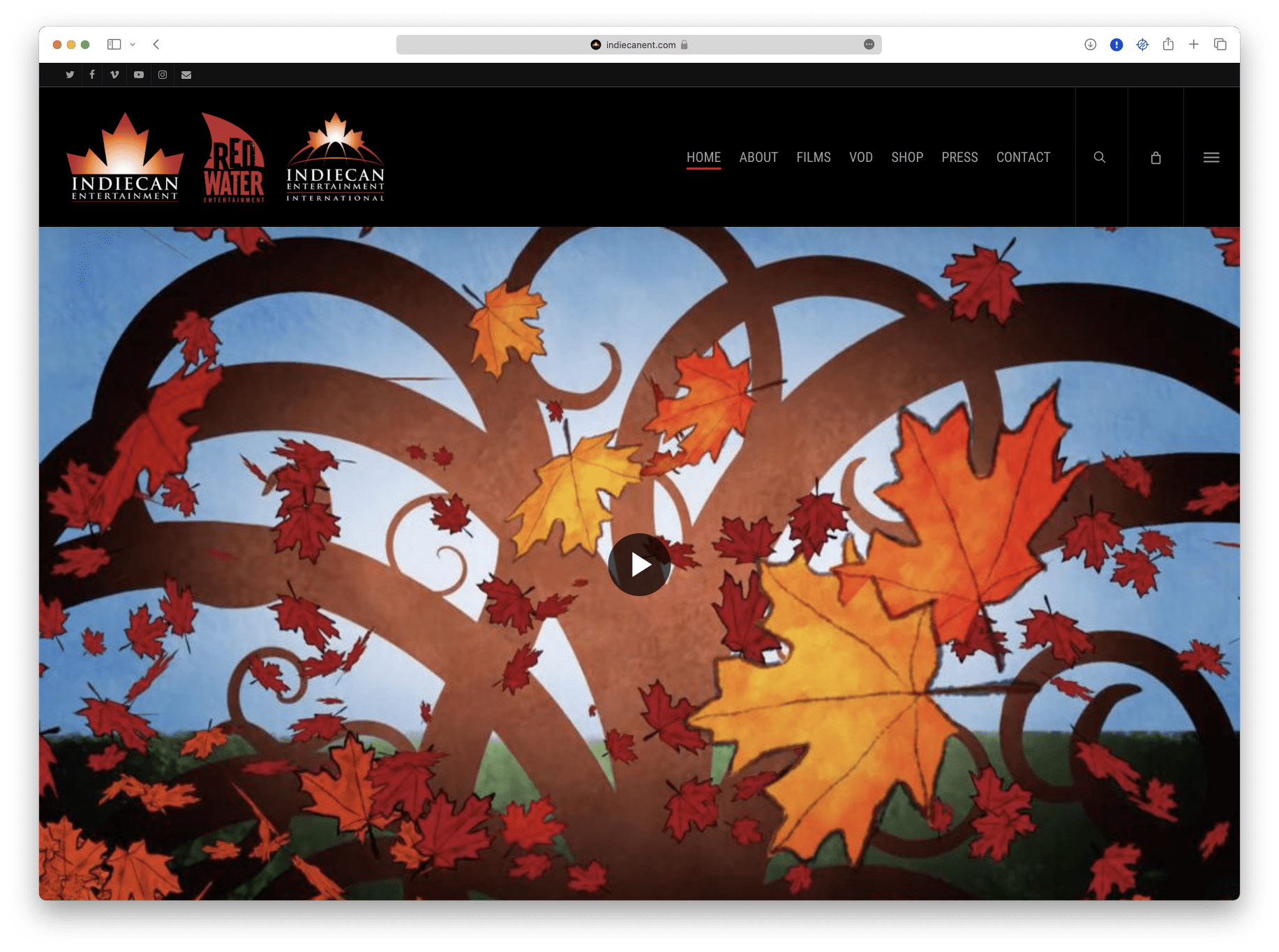 A website featuring Indiecan Entertainment with an image of a tree and leaves.