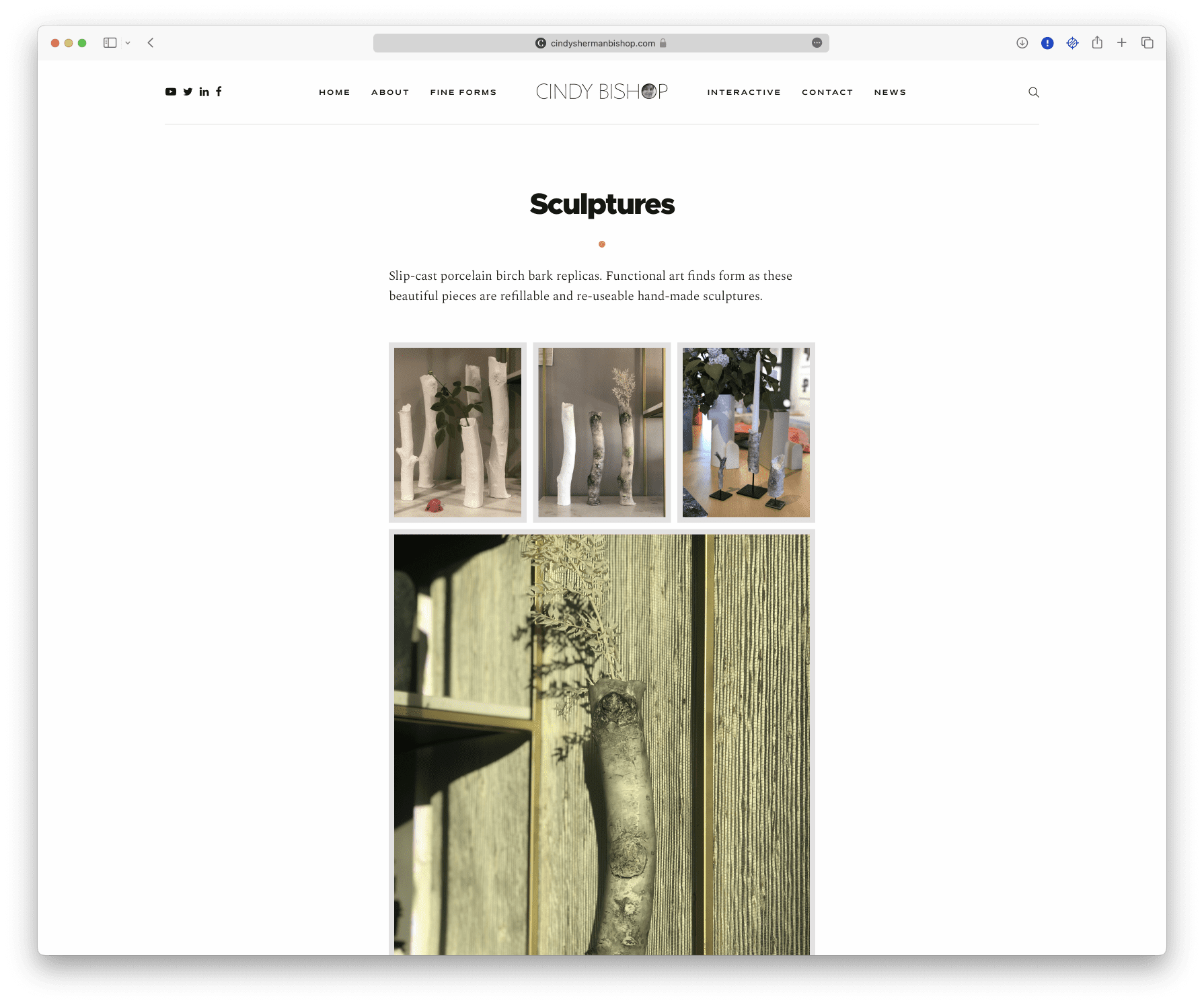 The homepage of a website showcasing an artistic picture of a tree by Cindy Sherman.